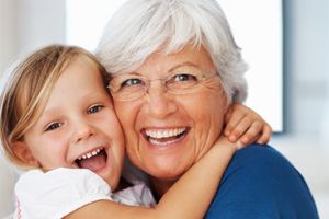 Young Girl & Elderly Woman Smiling