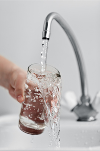 Filing A Glass With Water